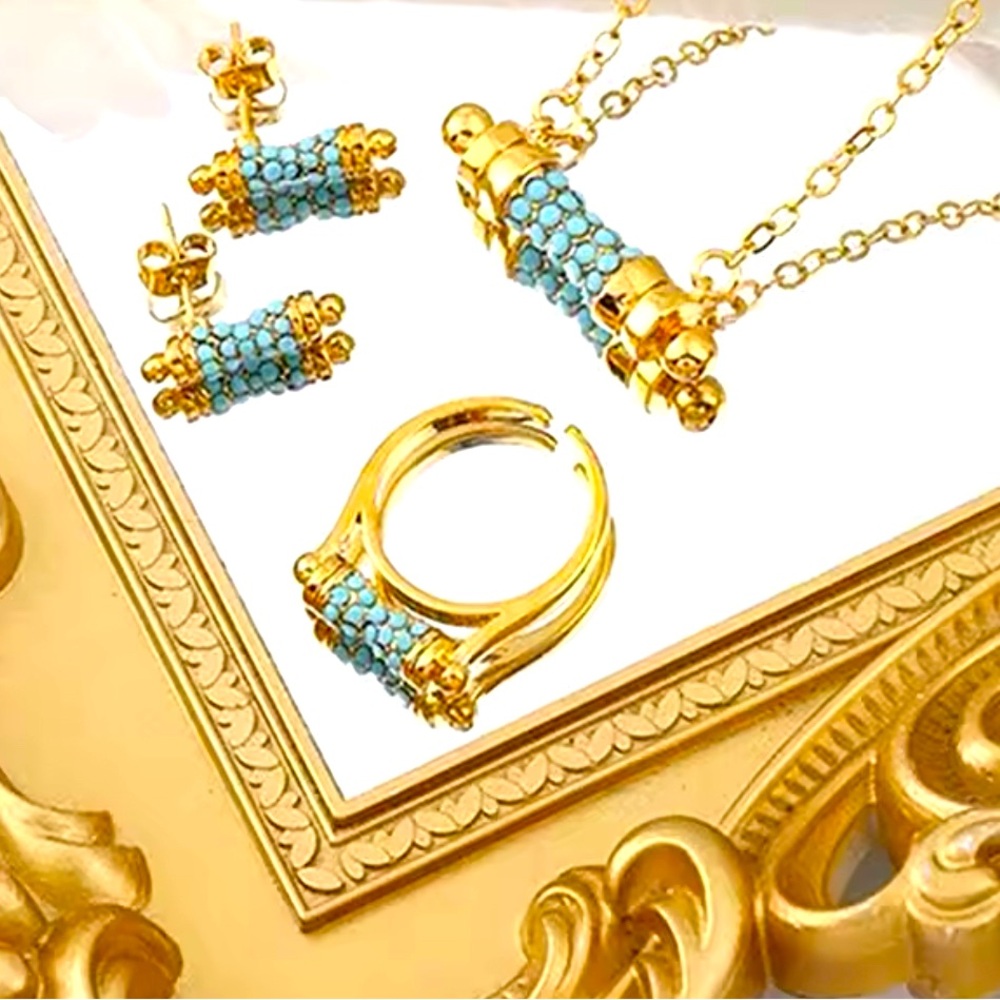 Beautiful blue stone in gold plated set.